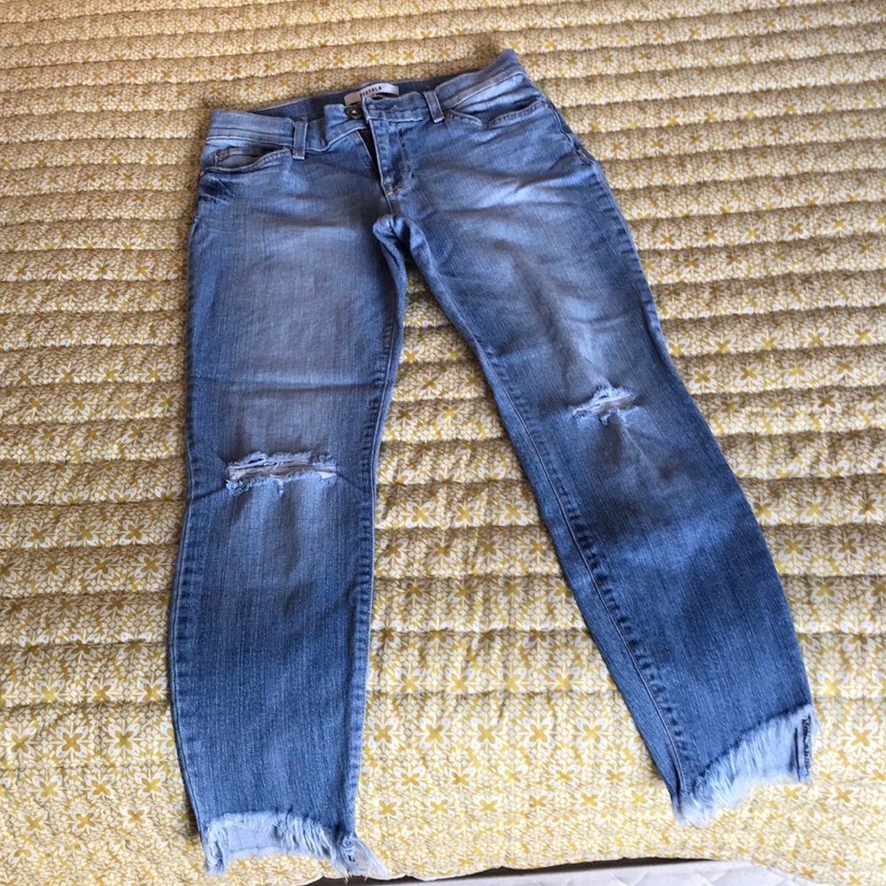 Light wash faded ripped jeans